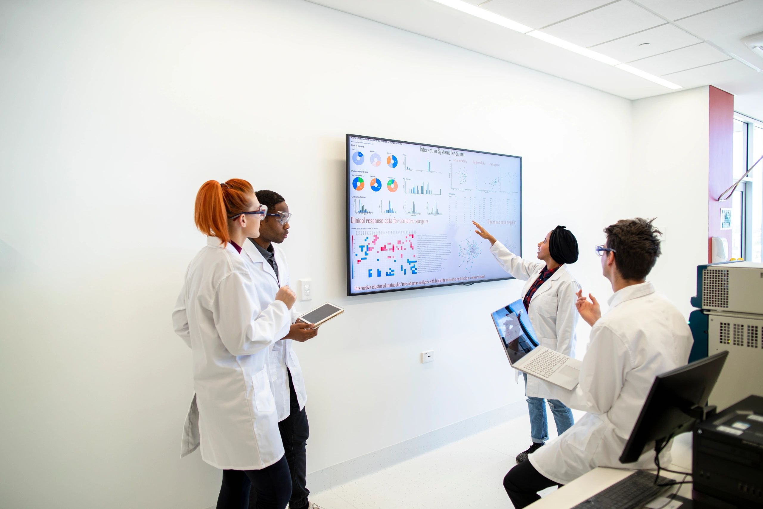 Medical technology team reviewing data and strategy