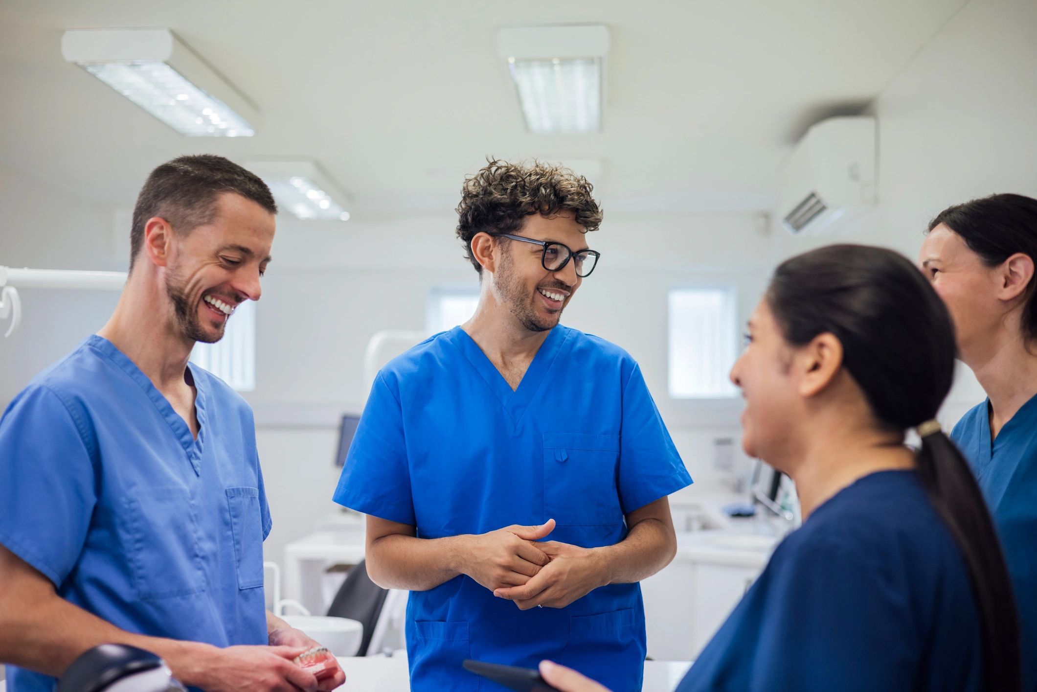 Healthcare professionals collaborating in a clinical setting